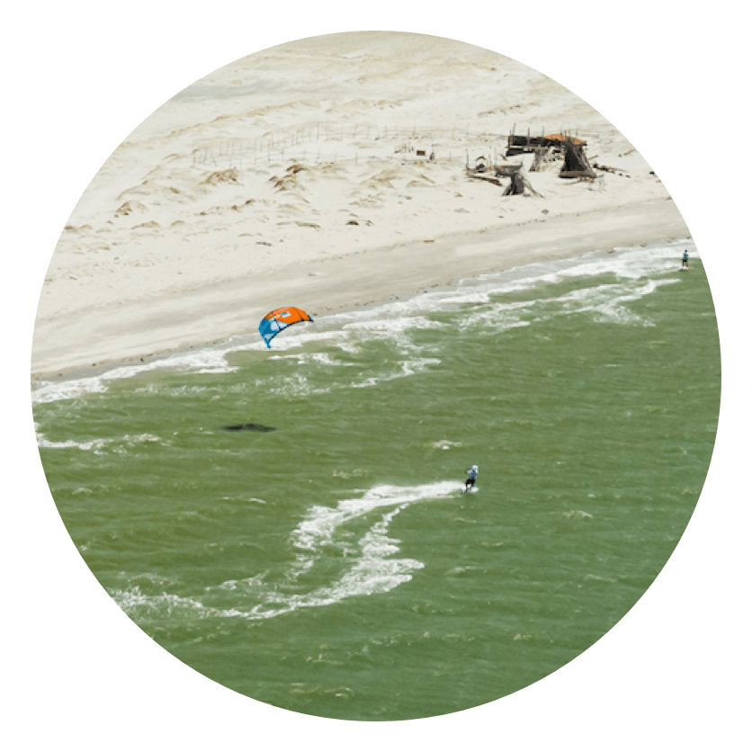 Van oord kite surfer arriving at the beach