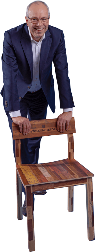 Cutout of CEO Pieter van Oord standing behind a chair